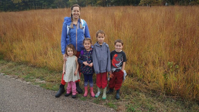 Amber Storm and her four kids on a hike at Lapham Peak