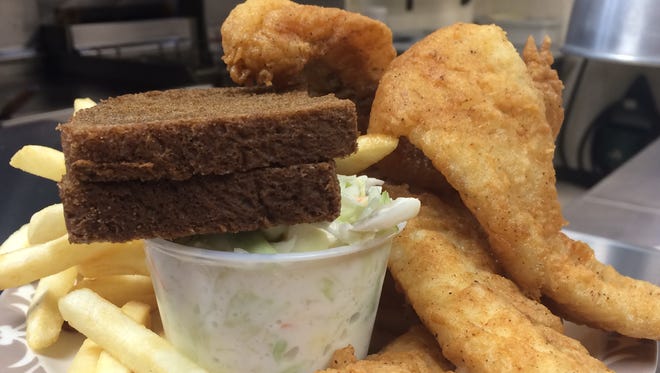 Three-piece beer-battered Alaskan pollock, served with French fries, bread and coleslaw, served at Kellner International.