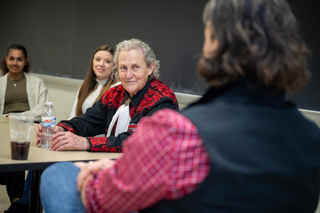 UW-River Falls students interact with and discuss animal welfare issues with world known anmial behavior expert Temple Grandin, center, during a recent visit to the campus.