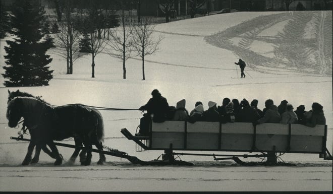 1991. Riders enjoy the 14th annual Winter Horse-drawn Vehicle Rally and Display at the Monona Golf Course in Madison.