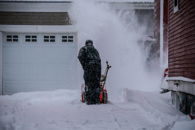 A James Lee plows his driveway Thursday, Feb. 07, 2019, in Wausau, Wis. T'xer Zhon Kha/USA TODAY NETWORK-Wisconsin