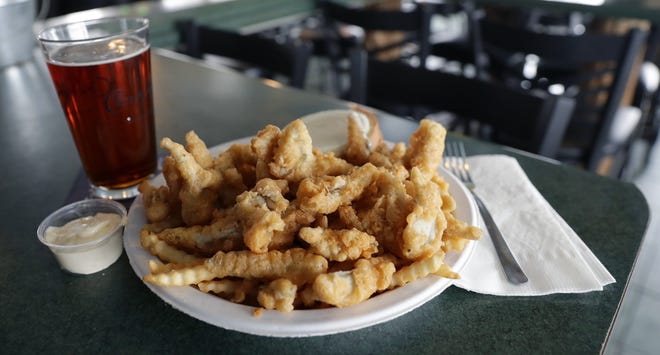 Beer-battered, deep-fried smelt is served with cole slaw, rye bread and fries or potato salad on Wednesdays while in season at River Street Pier in Howard. It draws a crowd.