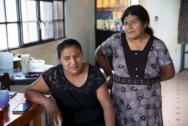 Roberto Tecpile's wife, Verónica Montalvo, and his mother, Concepciona Acahua, in the home that Tecpile's family is building in Astacinga, México, thanks to his work at  a Wisconsin dairy farm.