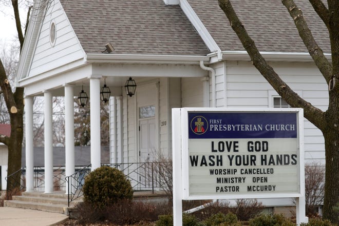 A message is sent to the community by the First Presbyterian Church Thursday, March 26, 2020, in Weyauwega, Wis. 
Dan Powers/USA TODAY NETWORK-Wisconsin