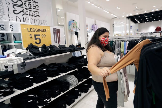 Kianna Linares of Green Bay shops for clothing at Forever 21 Wednesday, May 20, 2020, at the Fox River Mall in Grand Chute, Wis.