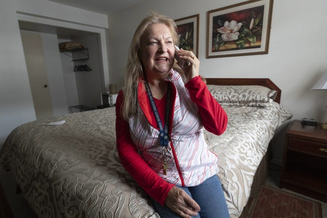Manager Margaret Gewont talks to a customer at Fitzgerald's Motel in Wisconsin Dells.