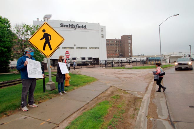 Federal regulators said Thursday, Sept. 10, 2020, they have cited Smithfield Foods for failing to protect employees from exposure to the coronavirus at the company's Sioux Falls plant, an early hot spot for virus infections that hobbled American meatpacking plants.