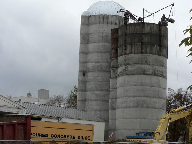 Two poured concrete silos were built at the UW-Madison some eight years ago by Wisconsin Silos, Plover, to store silage for  the campus dairy herd.