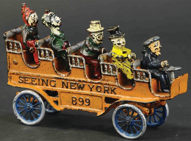 This toy tourist bus was made about 1910 by the Kenton Hardware Co. in Ohio. Not all of the passengers were part of the original toy, but suitable replacements had been found. It is a rare toy, so rare it auctioned for a little over $1,000.